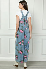 Load image into Gallery viewer, Veveret Painted Floral Print Denim Jumpsuit in Medium Wash
