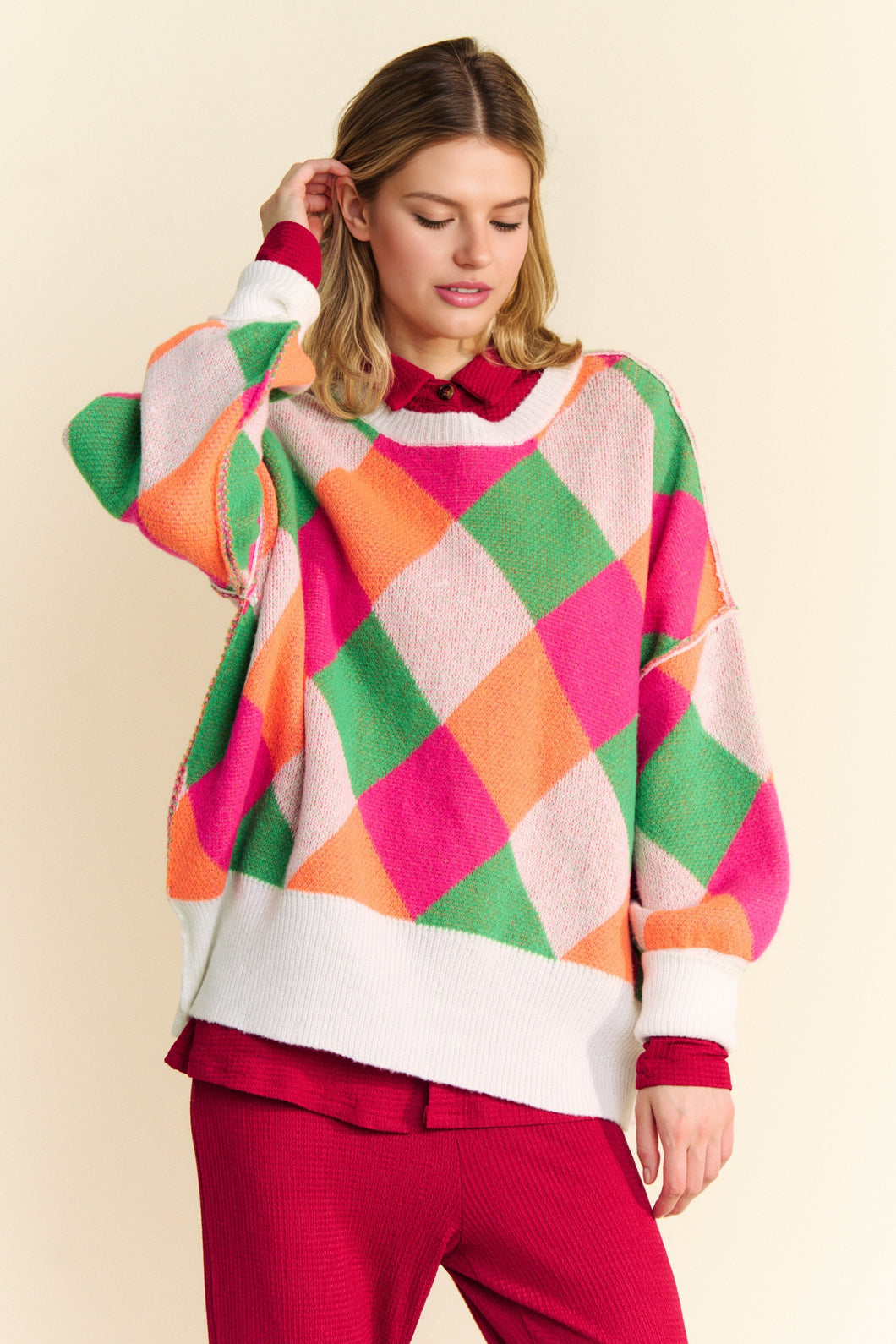 Davi & Dani Multi Colored Diamond Pattern Knit Sweater in Pink Orange