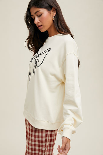 Wishlist French Terry Knit Top with Bow Print Front in Cream/Black