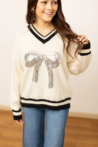 Emma+Grace Varsity Sweater with Sequin Bow on Front in Cream