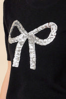 Main Strip Sweater Knit Top with Sequin Bow Front in Black