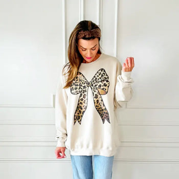 Poppy & Pine Solid Color Sweatshirt with Leopard Graphic Print Bow in Sweet Cream