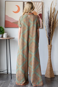 Oli & Hali Mixed Print Reversible Jumpsuit in Teal Rust