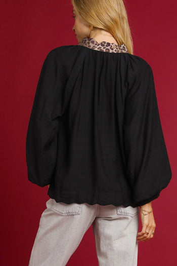 Umgee Solid Color Leopard Trim Top in Black
