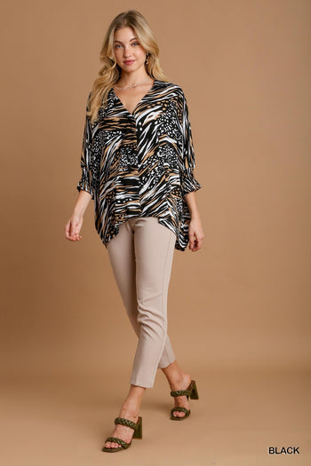 Umgee Animal Print V-Neck Top in Black