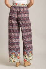 Load image into Gallery viewer, Umgee Wide Fit Mixed Print Bottoms with Elastic Waistband &amp; Side Pockets in Maroon Mix
