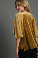 Umgee Solid Velvet Top with Animal Print Burnout Sleeves in Gold