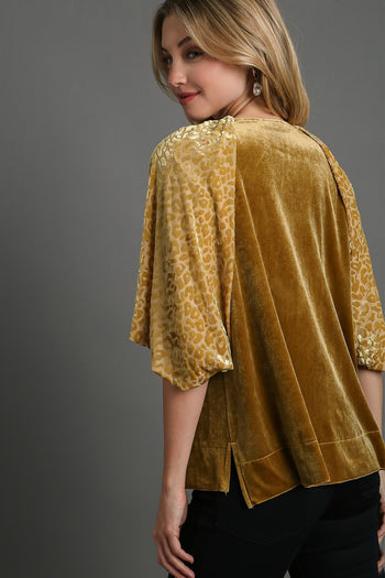 Umgee Solid Velvet Top with Animal Print Burnout Sleeves in Gold