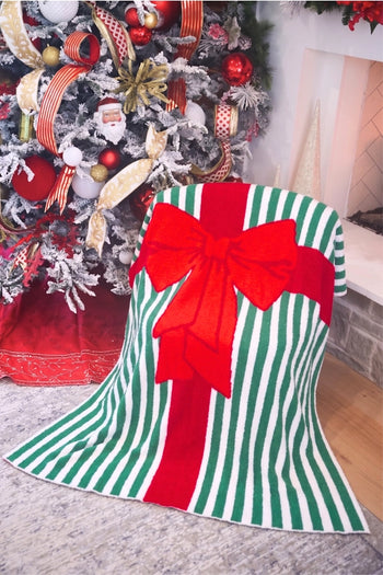 Jess Lea Wrapped with A Bow Blanket in Red/Green