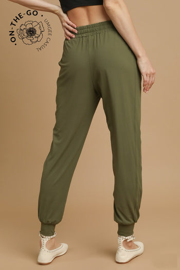 Umgee Elastic Drawstring Joggers in Moss