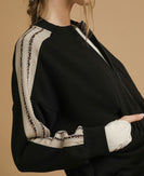Umgee Luxeknit Jacket with Contrasting Stripe Sleeves in Black