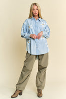 Davi & Dani Chambray and Waffle Knit Top with Daisy Patches in Light Denim