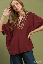 Load image into Gallery viewer, Umgee Leopard Trim Dolman Sleeve Blouse in Burgundy

