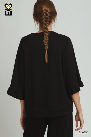 Umgee Luxeknit Round Neck Ruffle Tier Raglan Sleeve Top in Black