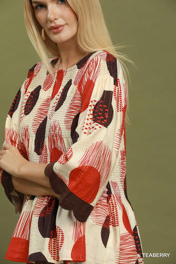 Umgee Abstract Dot Smocked Peplum Top in Teaberry