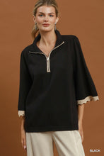 Load image into Gallery viewer, Umgee Quarter-Zip Scalloped Sleeve Knit Top in Black
