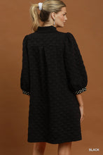 Load image into Gallery viewer, Umgee Jacquard Textured Swiss Dot Contrast Trim Shift Dress in Black
