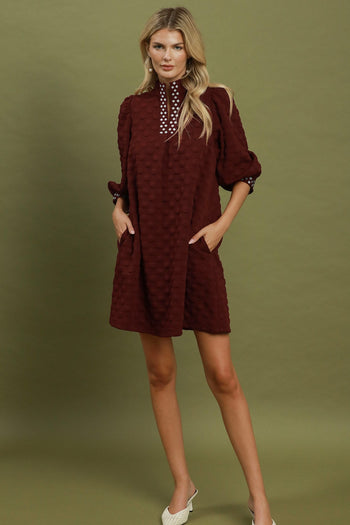 Umgee Jacquard Textured Swiss Dot Contrast Trim Shift Dress in Wine
