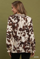 Umgee Cowhide Print Contrast Trim Blouse in Brown