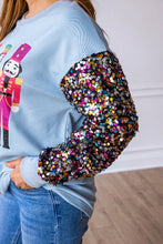 Load image into Gallery viewer, Grace+Emma Solid Color Nutcracker Print Top with Sequin Sleeves in Blue
