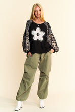 Load image into Gallery viewer, Davi &amp; Davi Waffle Knit Top with Flower Patch Front in Black
