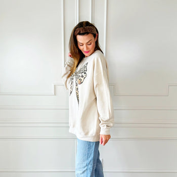 Poppy & Pine Solid Color Sweatshirt with Leopard Graphic Print Bow in Sweet Cream