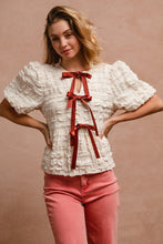 Load image into Gallery viewer, BiBi Textured Woven Peplum Bow Tie Top in Cream
