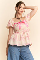 Davi & Dani Bow Print Peplum Top in Pink