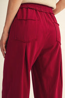 Jodifl Drawstring Waist Raw Cut Detail Sweatpants in Burgundy
