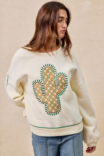 BiBi Fleece Sweatshirt with Embroidered Cactus Patch on Front in Cream