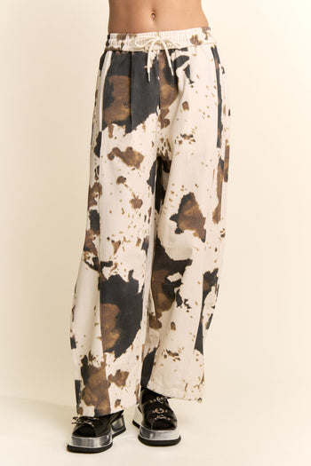 Davi & Dani Wide Leg Drawstring Hem Pants in Cow Print
