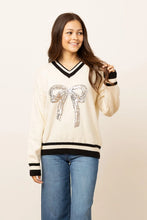 Load image into Gallery viewer, Emma+Grace Varsity Sweater with Sequin Bow on Front in Cream
