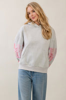 Veveret Sweatshirt Hoodie With Patchwork Sleeve Detail in Pink