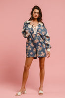 BiBi Floral Print Denim Romper with Contrasting Fabric in Denim **PLEASE REVIEW DESCRIPTION DETAILS ON SIZING**