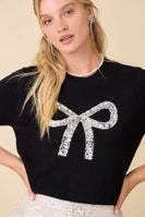 Main Strip Sweater Knit Top with Sequin Bow Front in Black