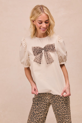 BiBi Solid Color Woven Top with Mesh Leopard Bow Front in Cream