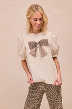 Load image into Gallery viewer, BiBi Solid Color Woven Top with Mesh Leopard Bow Front in Cream
