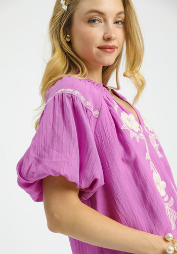 Umgee Solid Color Top with Contrasting Color Floral Embroidery in Orchid