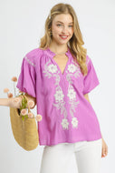 Umgee Solid Color Top with Contrasting Color Floral Embroidery in Orchid