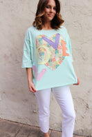 Easel OVERSIZED Heart and Love Patched Top in Mint Blue