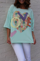 Easel OVERSIZED Heart and Love Patched Top in Mint Blue
