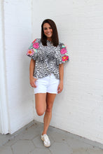 Load image into Gallery viewer, VOY Abstract Print Top with Floral Embroidery on Sleeves in Black
