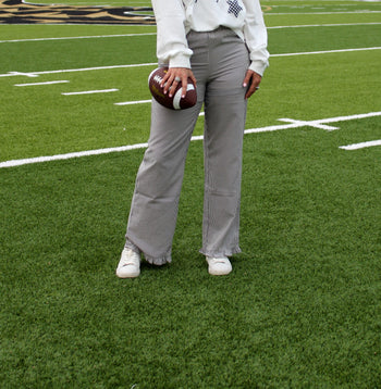 Things Between Striped Ruffle Hem Pants in Black