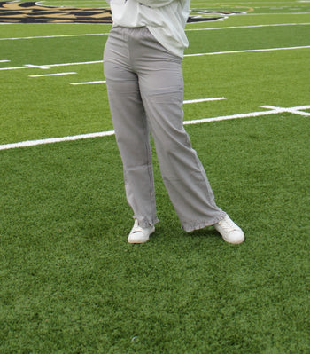 Things Between Striped Ruffle Hem Pants in Black