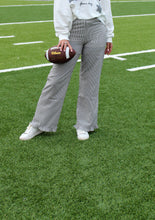 Load image into Gallery viewer, Things Between Striped Ruffle Hem Pants in Black
