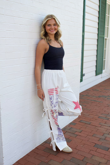 Peach Love USA Graphic Print Twill Pants in Off White