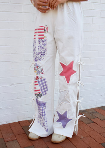 Peach Love USA Graphic Print Twill Pants in Off White