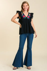 Umgee Floral Embroidery Top with Pom Pom Details in Black  Umgee   
