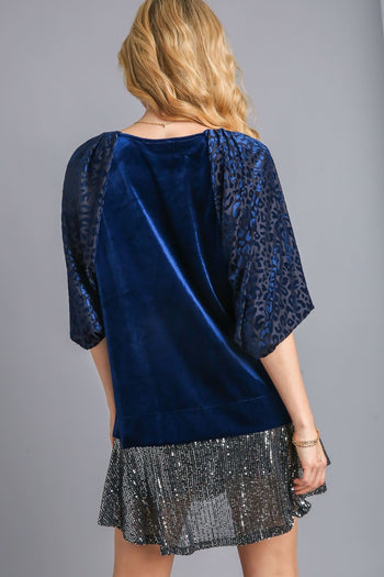 Umgee Solid Velvet Top with Animal Print Burnout Sleeves in Navy