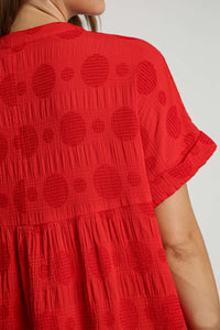 Umgee Solid Color Swiss Dot Jacquard Top in Red